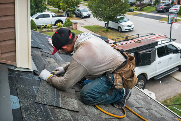 Professional Gutter Repair And Installation technician working in Terryville, CT